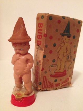 c.1930s bubbling celluloid peeing baby novelty toy (front)